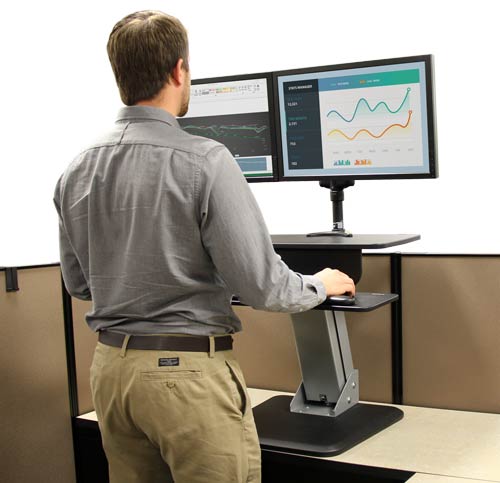 The sit-to-stand workstation lets you change to a standing position in moments with the one-touch height adustment