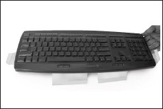 <center>Gently lay cover over keyboard and align cover with the keys.</center>