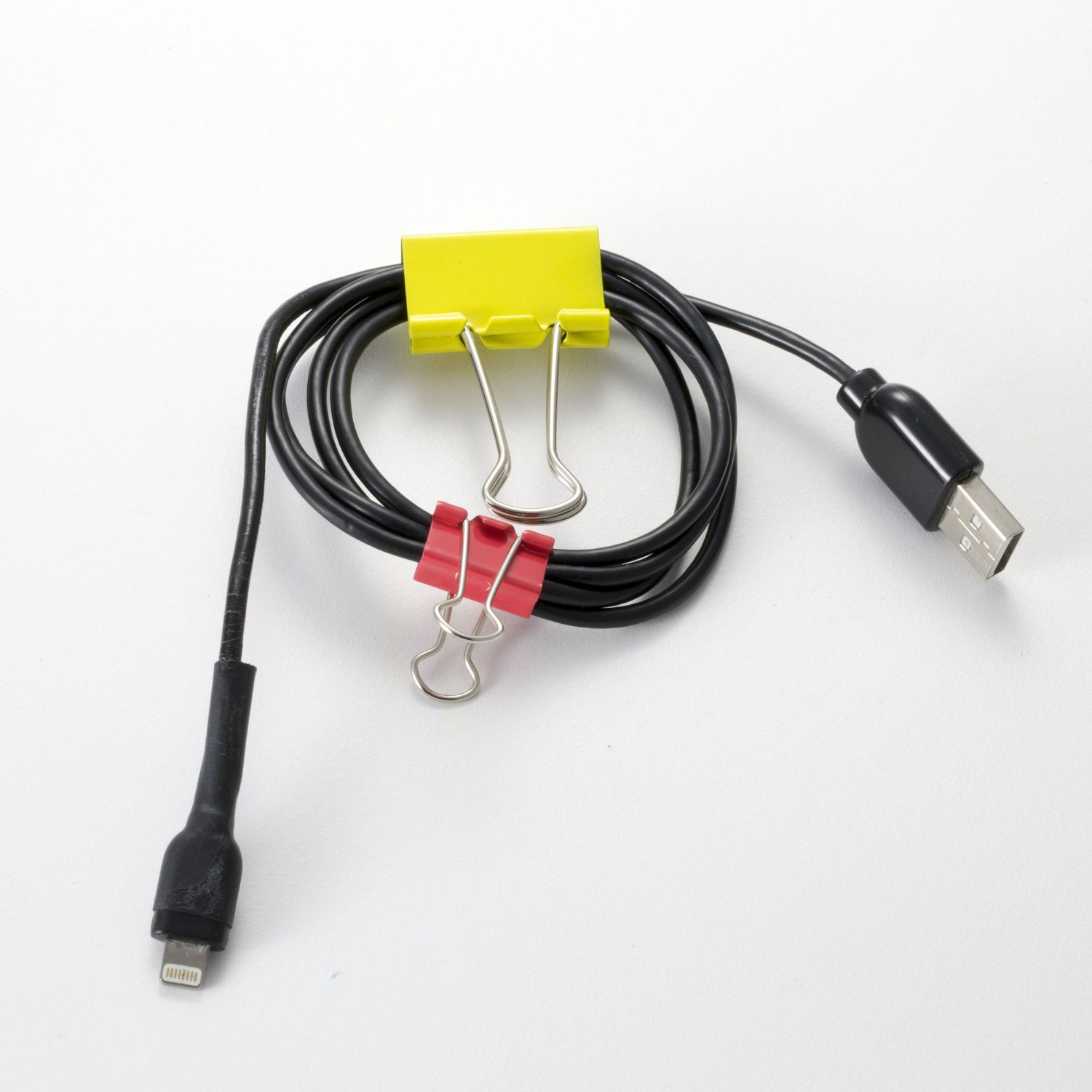 Handles can fold up for hanging or can be removed for binding